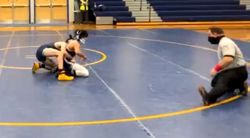Pine Bush’s James Duffy controls Newburgh’s Matthew Mercado in this screenshot of a 126-pound bout at Wednesday’s OCIAA wrestling match at Pine Bush High School. The meet was livestreamed over social media, with no spectators or media permitted inside the gym.
